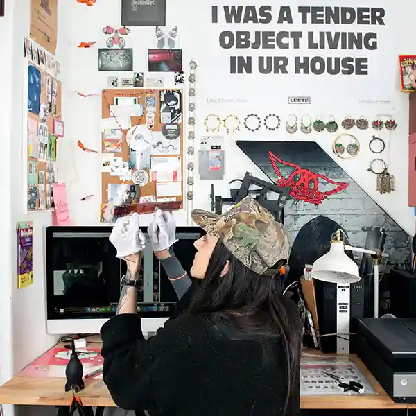 woman developing analog photographs from her office