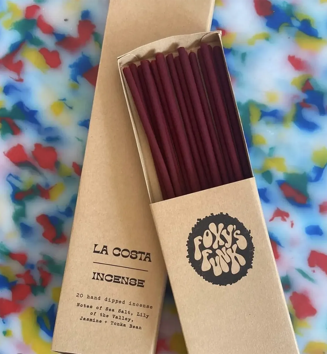 box of red incense sticks with the Foxy's Funk logo printed on it