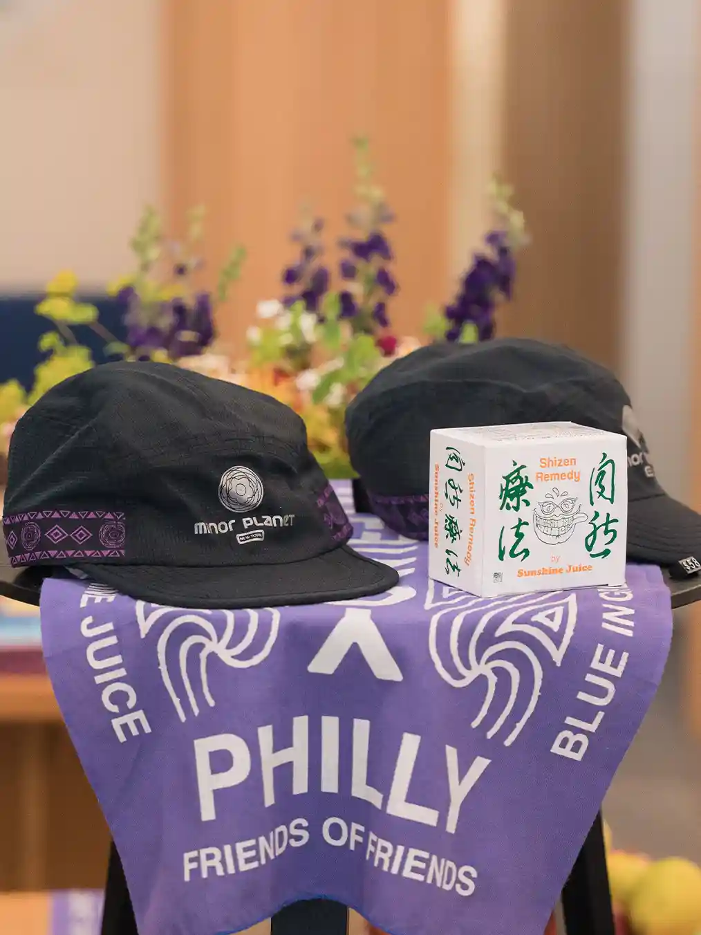 purple scarves and black caps