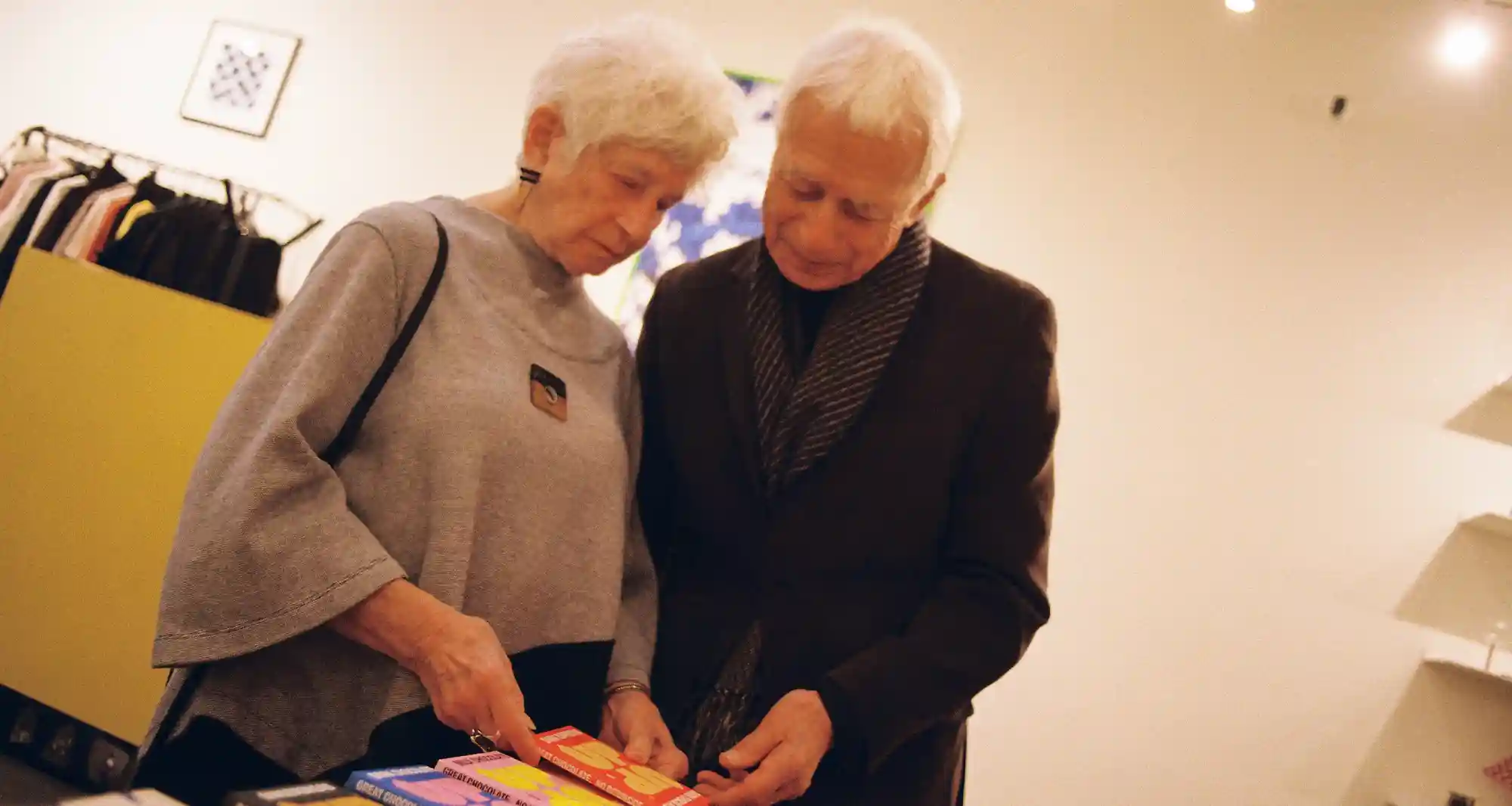 older couple looking at books