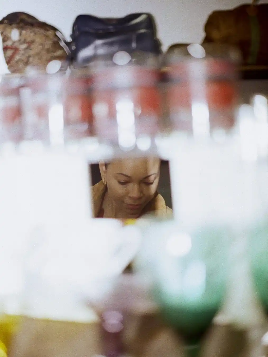 blurred image of a woman's face in a mirror