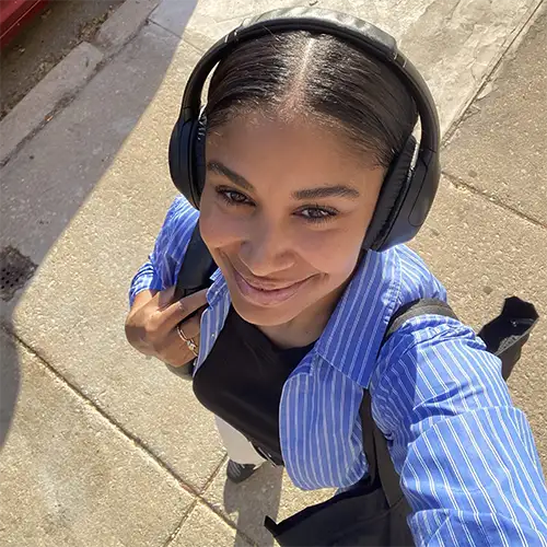 selfie of a woman walking on the street